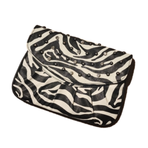 Grace Adele clutch bag zebra with rhinestone and stud embellishments.